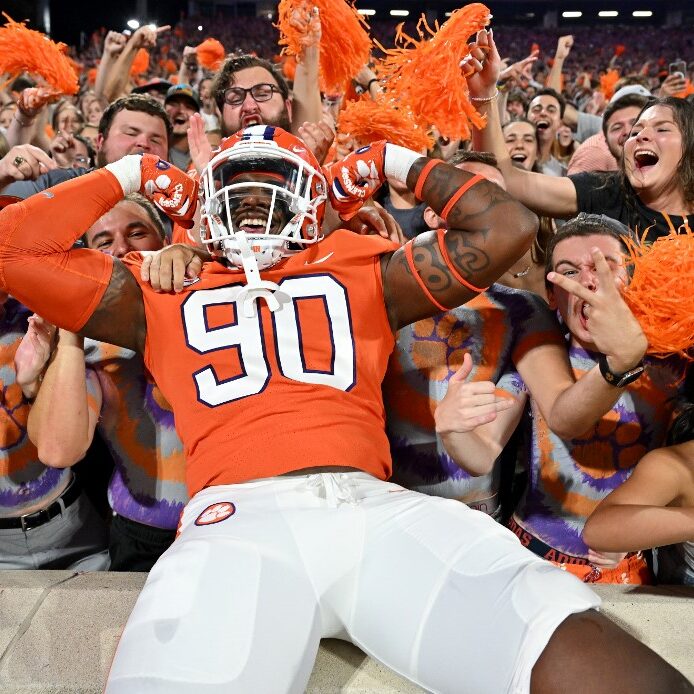 jabriel-robinson-clemson-tigers-jumps-into-the-student-section-aspect-ratio-1-1