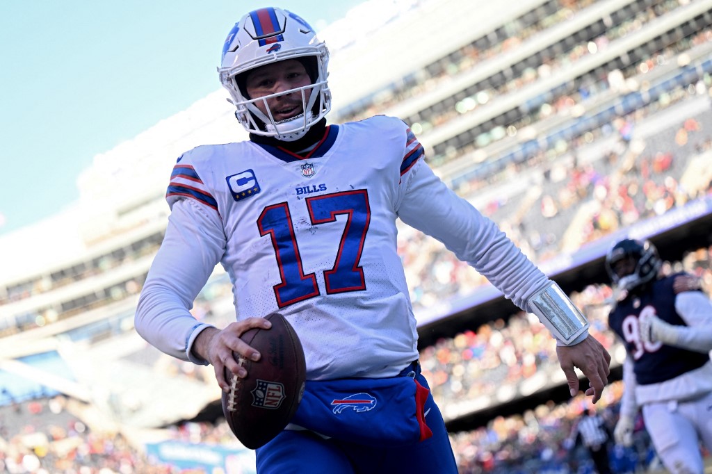 CHICAGO, IL - DECEMBER 24: Buffalo Bills quarterback Josh Allen (17) throws  the football in action during a game between the Buffalo Bills and the  Chicago Bears on December 24, 2022, at