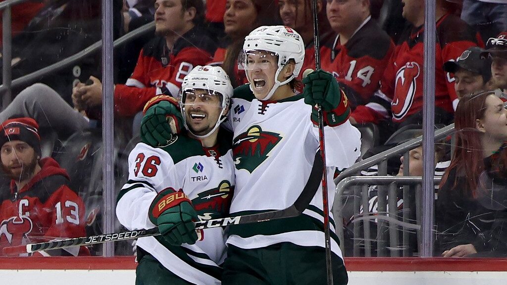 Matt-Boldy-of-the-Minnesota-Wild-celebrates-his-game-winning-goal-with-teammate-Mats-Zuccarello-against-the-New-Jersey-Devils-aspect-ratio-16-9