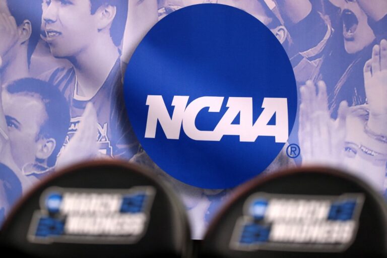 The NCAA logo is seen during an NCAA Men's Basketball Tournament game.