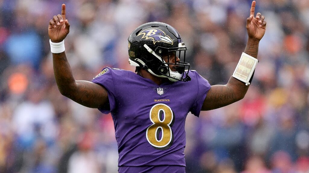 Quarterback Lamar Jackson of the Baltimore Ravens celebrates his