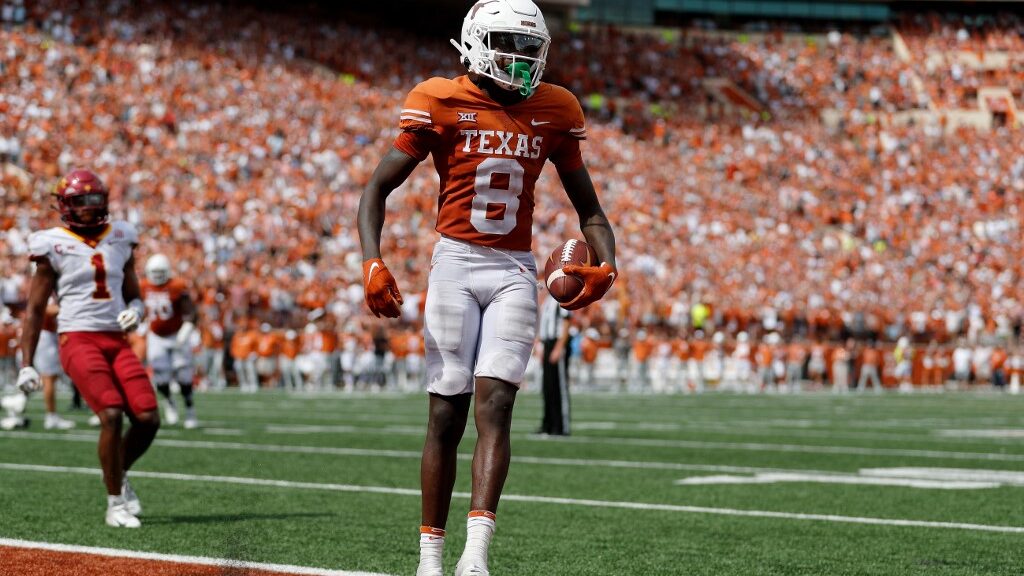 Xavier-Worthy-8-of-the-Texas-Longhorns-reacts-after-catching-a-pass-for-a-touchdown-aspect-ratio-16-9