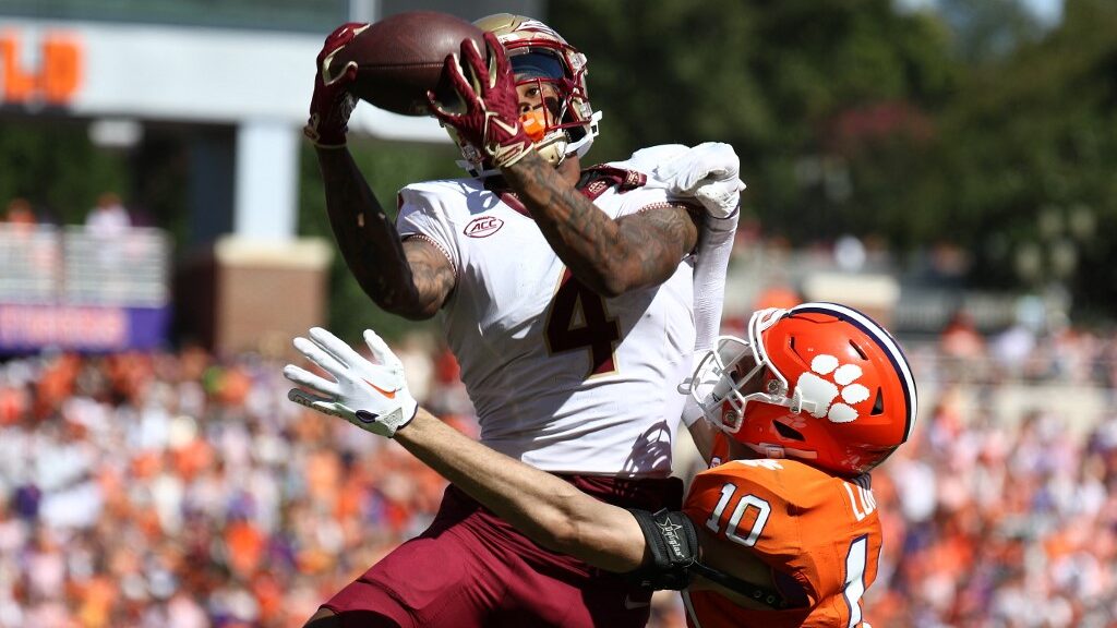 Keon-Coleman-4-of-the-Florida-State-Seminoles-makes-the-game-winning-catch-against-Jeadyn-Lukus-10-of-the-Clemson-Tigers-aspect-ratio-16-9