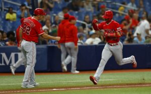 Logan O'Hoppe of the Los Angeles Angels is congratulated after hitting a home run against the Tampa Bay Rays.