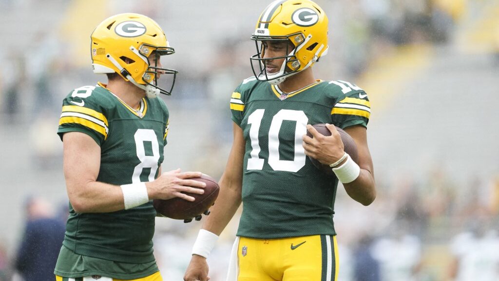 Sean-Clifford-8-and-Jordan-Love-10-of-the-Green-Bay-Packers-talk-before-a-preseason-game-against-the-Seattle-Seahawks-aspect-ratio-16-9