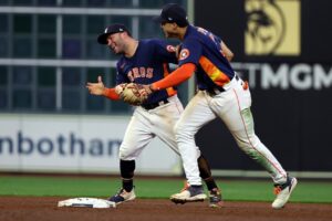 Jose Altuve and Jeremy Pena of the Houston Astros celebrate after defeating the Philadelphia Phillies