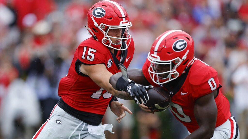 Carson-Beck-15-of-the-Georgia-Bulldogs-hands-off-to-Roderick-Robinson-II-0-during-the-second-half-against-the-South-Carolina-Gamecocks-at-Sanford-Stadium-aspect-ratio-16-9