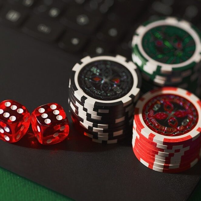online-poker-casino-token-dices-laptop-1-aspect-ratio-1-1