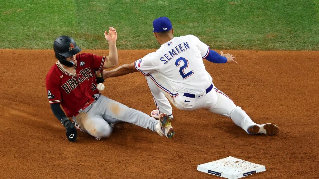 Alek-Thomas-5-of-the-Arizona-Diamondbacks-steals-second-base-past-Marcus-Semien-2-of-the-Texas-Rangers-in-the-sixth-inning-during-Game-One-of-the-World-Series-aspect-ratio-16-9