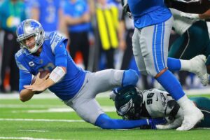 Jared Goff of the Detroit Lions is sacked during the game against the Philadelphia Eagles. This matchup is featured in our NFL odds week 11 piece.