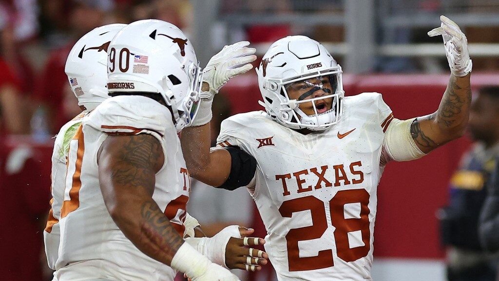 Jerrin-Thompson-28-of-the-Texas-Longhorns-celebrates-with-teammates-after-intercepting-the-ball-during-the-fourth-quarter-against-the-Alabama-Crimson-Tide-aspect-ratio-16-9