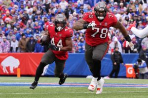 Sean Tucker #44 of the Tampa Bay Buccaneers runs the ball for a touchdown during the second quarter against the Buffalo Bills.
