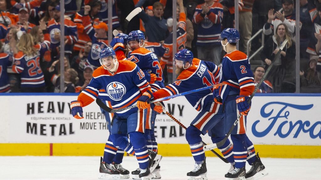 Zach-Hyman-18-of-the-Edmonton-Oilers-celebrates-a-goal-against-the-Boston-Bruins-during-the-third-period-at-Rogers-Place-on-February-21-2024-aspect-ratio-16-9