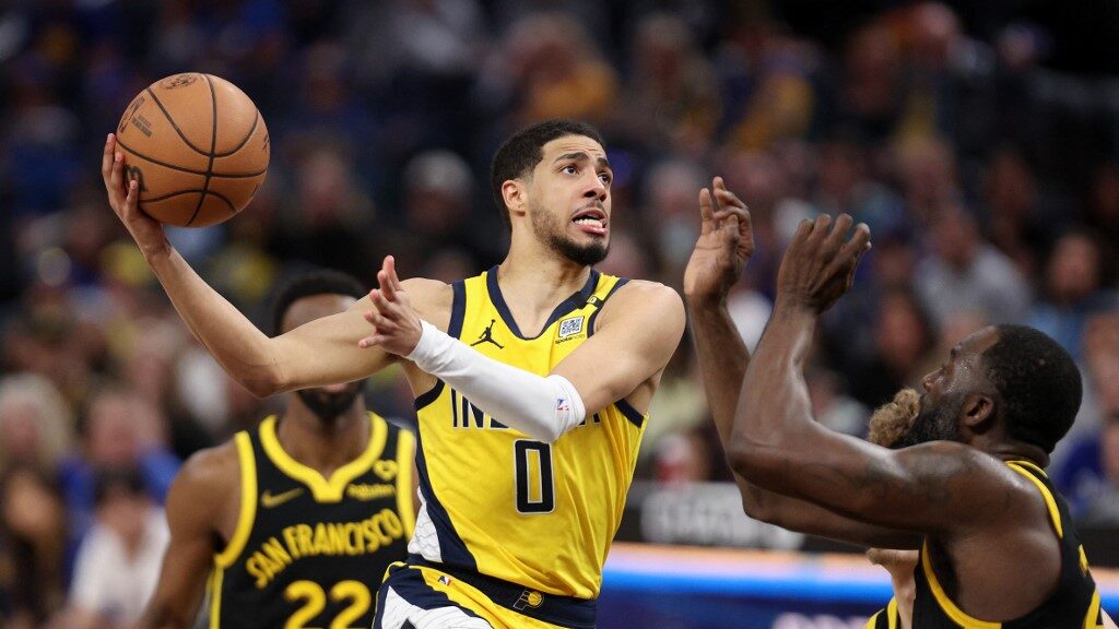 Tyrese-Haliburton-0-of-the-Indiana-Pacers-goes-up-for-a-shot-against-Draymond-Green-23-of-the-Golden-State-Warriors-in-the-second-half-at-Chase-Center-on-March-22-2024-aspect-ratio-16-9