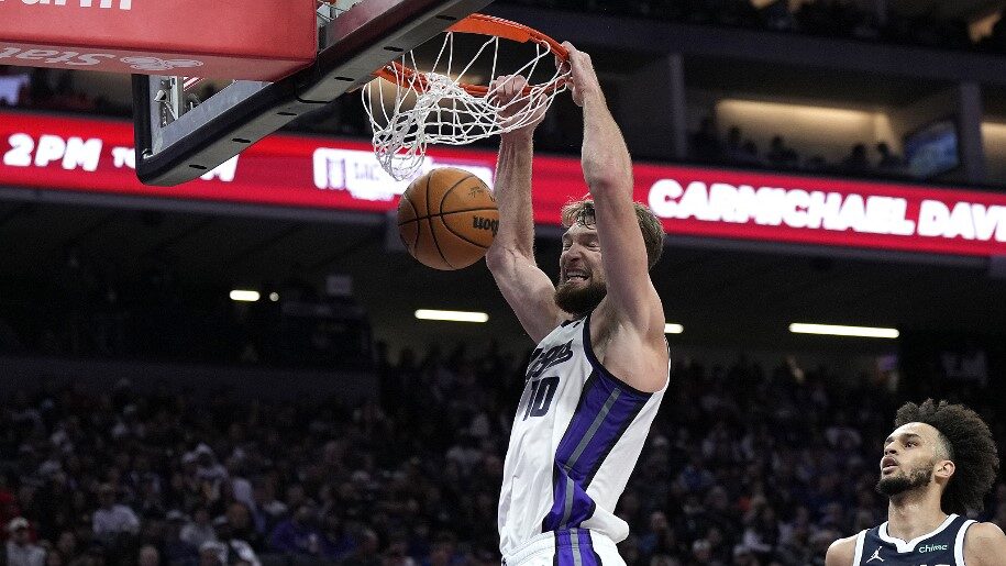 Domantas-Sabonis-10-of-the-Sacramento-Kings-slam-dunks-against-the-Dallas-Mavericks-during-the-second-half-at-Golden-1-Center-on-March-29-2024-aspect-ratio-16-9