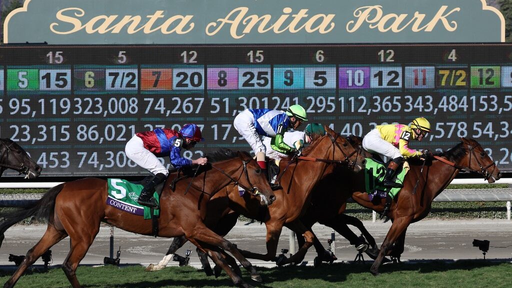 Jockey-Flavien-Prat-rides-Hard-to-Justify-to-victory-during-the-Breeders-Cup-Juvenile-Fillies-Turf-Grade-1-at-Santa-Anita-Park-on-November-03-2023-aspect-ratio-16-9