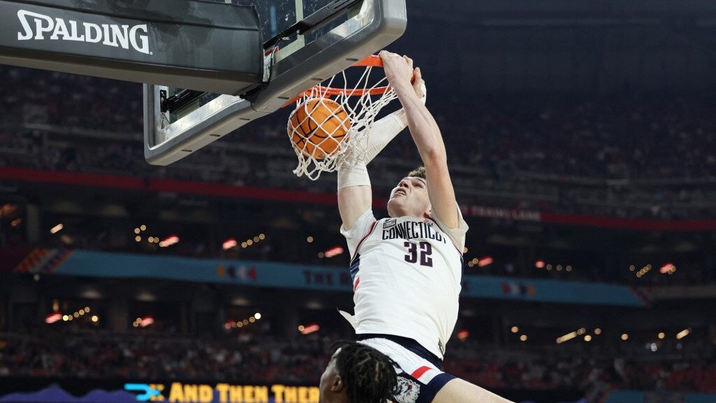 Donovan-Clingan-32-of-the-Connecticut-Huskies-dunks-the-ball-in-the-first-half-against-the-Alabama-Crimson-Tide-in-the-NCAA-Mens-Basketball-Tournament-Final-Four-semifinal-aspect-ratio-16-9