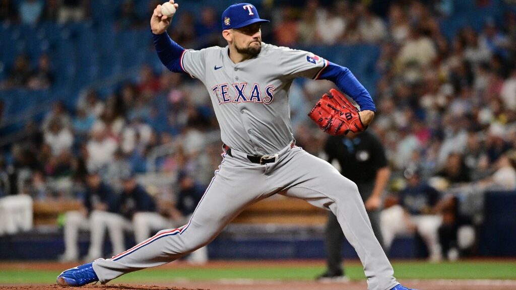Nathan-Eovaldi-17-of-the-Texas-Rangers-delivers-a-pitch-to-the-Tampa-Bay-Rays-in-the-first-inning-at-Tropicana-Field-on-April-03-2024-aspect-ratio-16-9