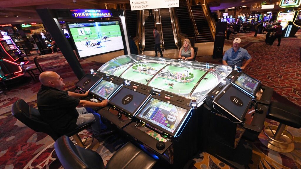 horse-racing-betting-machines-at-casino-aspect-ratio-16-9