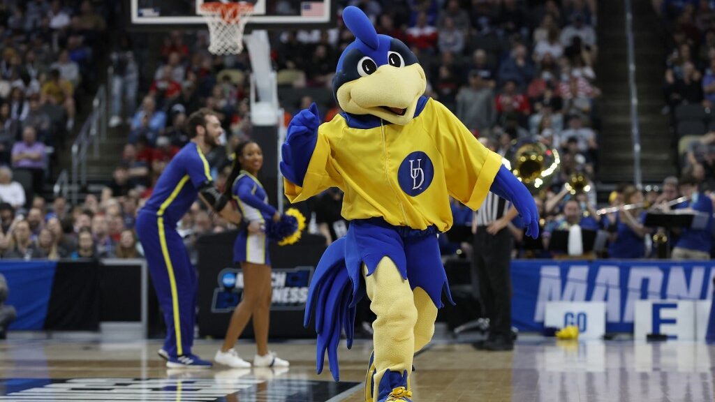 Delaware-Fightin-Blue-Hens-mascot-YoUDee-performs-during-a-timeout-during-the-first-half-against-the-Villanova-Wildcats-in-the-first-round-game-of-the-2022-NCAA-Mens-Basketball-Tournament-aspect-ratio-16-9