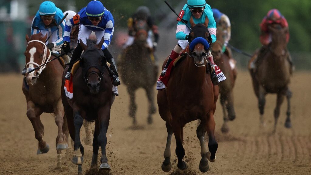 Jockey-John-Velazquez-1-riding-National-Treasure-R-rides-to-cross-the-finish-line-first-to-win-the-148th-Running-of-the-Preakness-Stakes-at-Pimlico-Race-Course-aspect-ratio-16-9