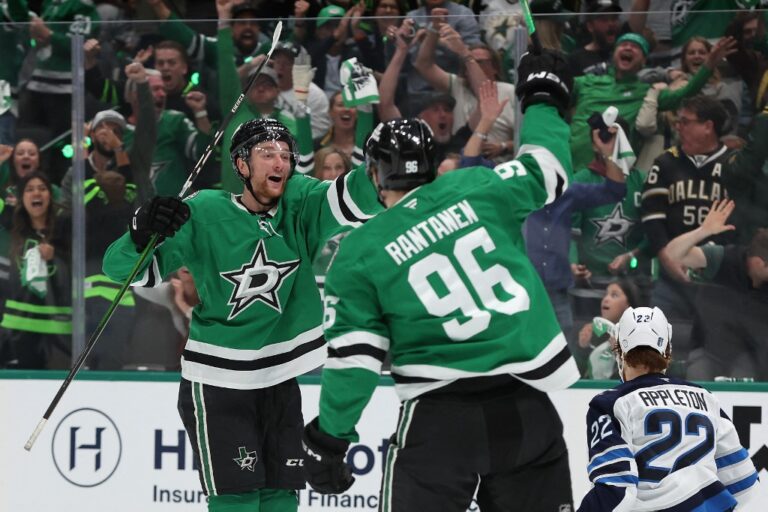 Thomas Harley #55 of the Dallas Stars celebrates with Mikko Rantanen #96 against the Winnipeg Jets.
