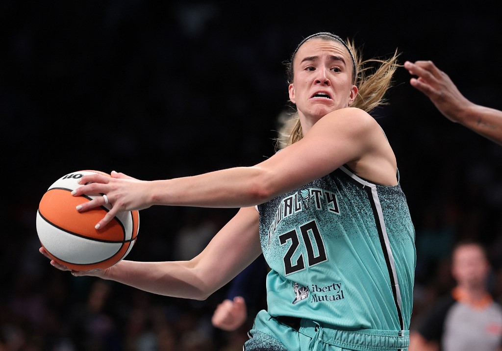 Sabrina Ionescu #20 of the New York Liberty drives against the Indiana Fever.