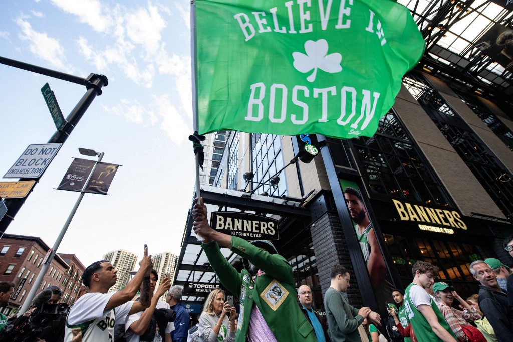 Supporters arrive for the NBA finals game two between the Boston Celtics and the Dallas Mavericks at the TD Garden.