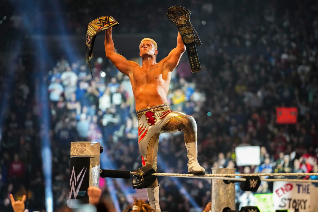 Cody Rhodes winning the championship belts.