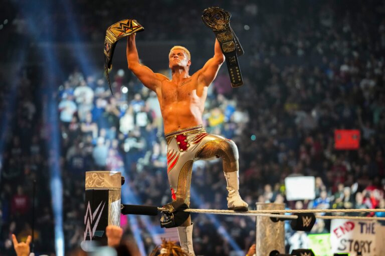Cody Rhodes winning the championship belts.