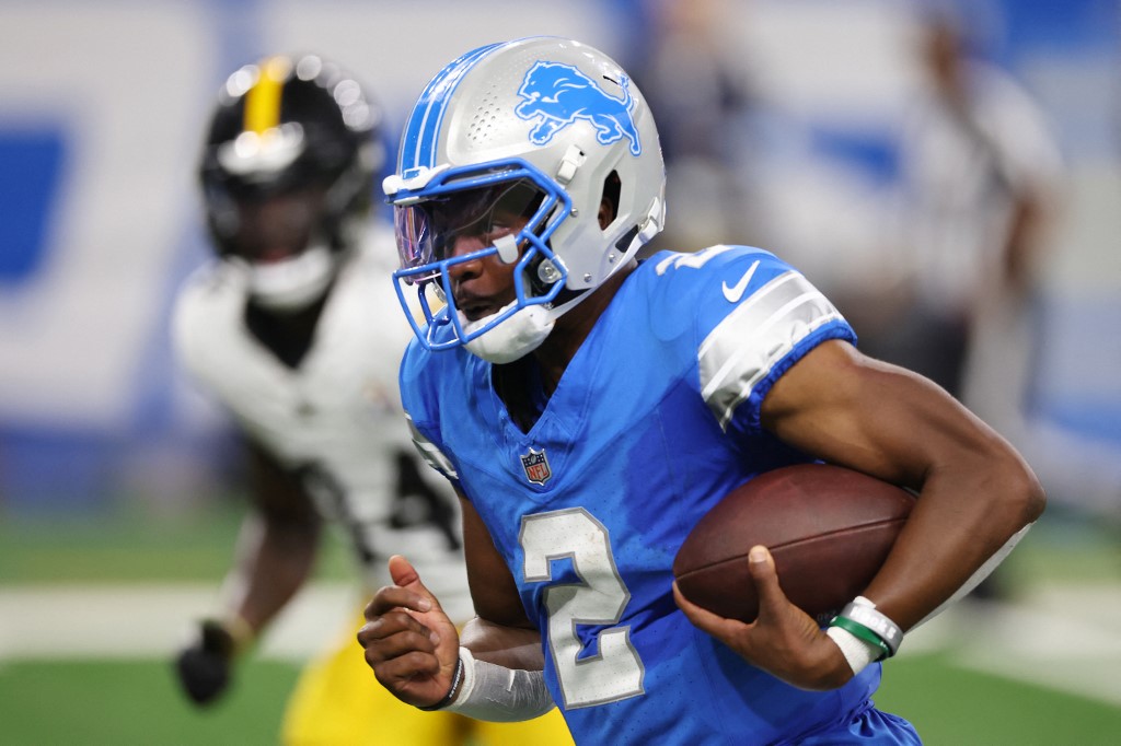 Hendon Hooker #2 of the Detroit Lions looks for running yards against the Pittsburgh Steelers.