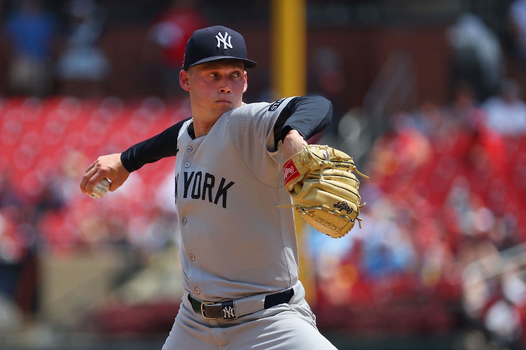 Will Warren #98 of the New York Yankees delivers a pitch against the St. Louis Cardinals