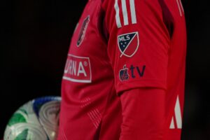 The Apple TV and MLS logo is seen on the jersey of Tomas Totland #14 of St. Louis CITY SC.