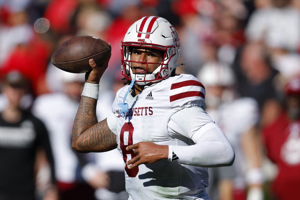 AJ Hairston #8 of the Massachusetts Minutemen looks to pass against the Georgia Bulldogs.