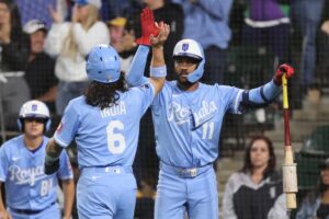 Jonathan India of the Kansas City Royals celebrates with Maikel Garcia.