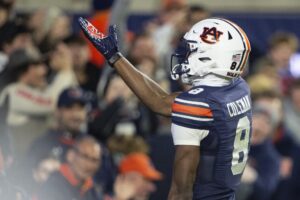 Wide receiver Cam Coleman #8 of the Auburn Tigers celebrates against the Texas A&M Aggies.