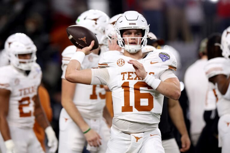 Arch Maning in Texas uniform
