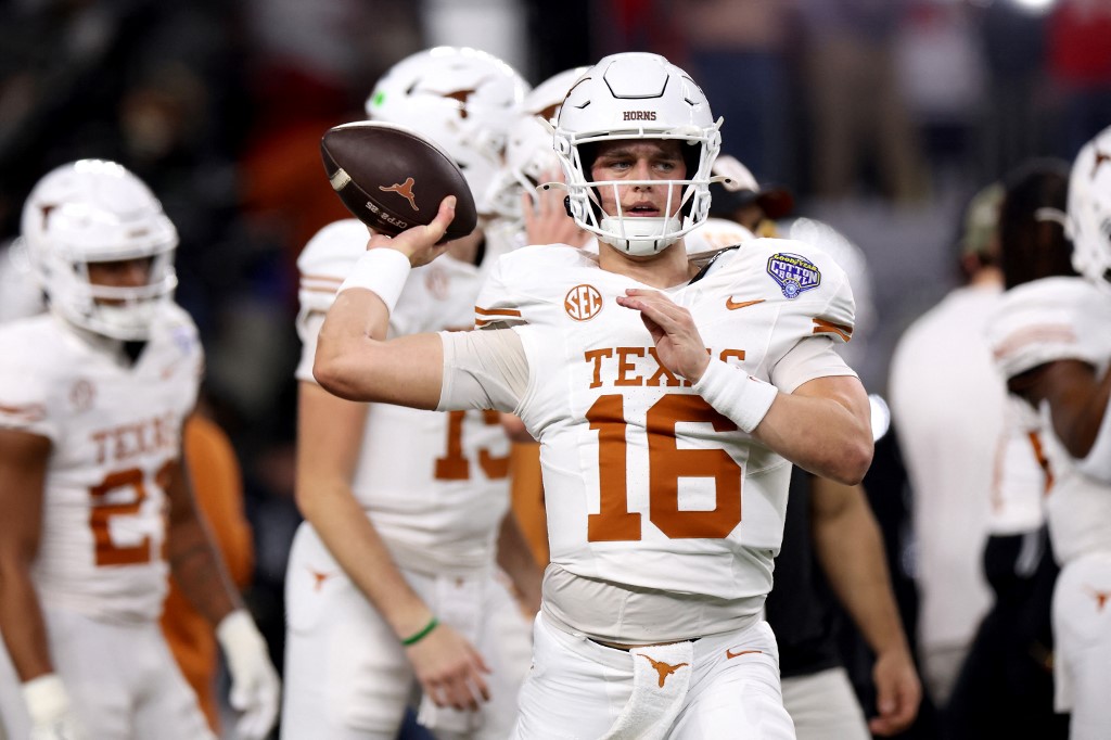 Arch Maning in Texas uniform