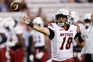 Santino Marucci #18 of the New Mexico State Aggies throws a pass before the game against the Texas A&M Aggies