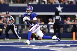 Wan'Dale Robinson #17 of the New York Giants catches a pass for a touchdown in the game against the Dallas Cowboys