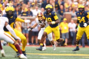 Bryce Underwood #19 of the Michigan Wolverines plays against the Central Michigan Chippewas