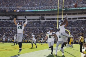 Kenneth Walker III #9 of the Seattle Seahawks celebrates a touchdown against the Pittsburgh Steelers