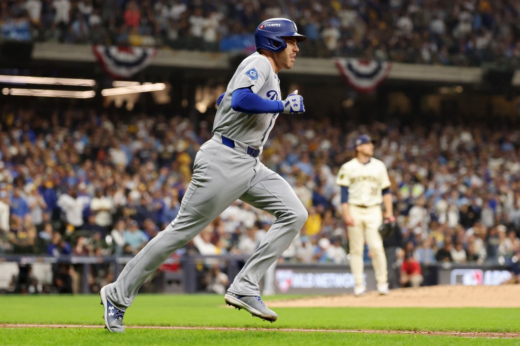 Freddie Freeman #5 of the Los Angeles Dodgers rounds the bases after hitting a home run during the sixth inning against the Milwaukee Brewers