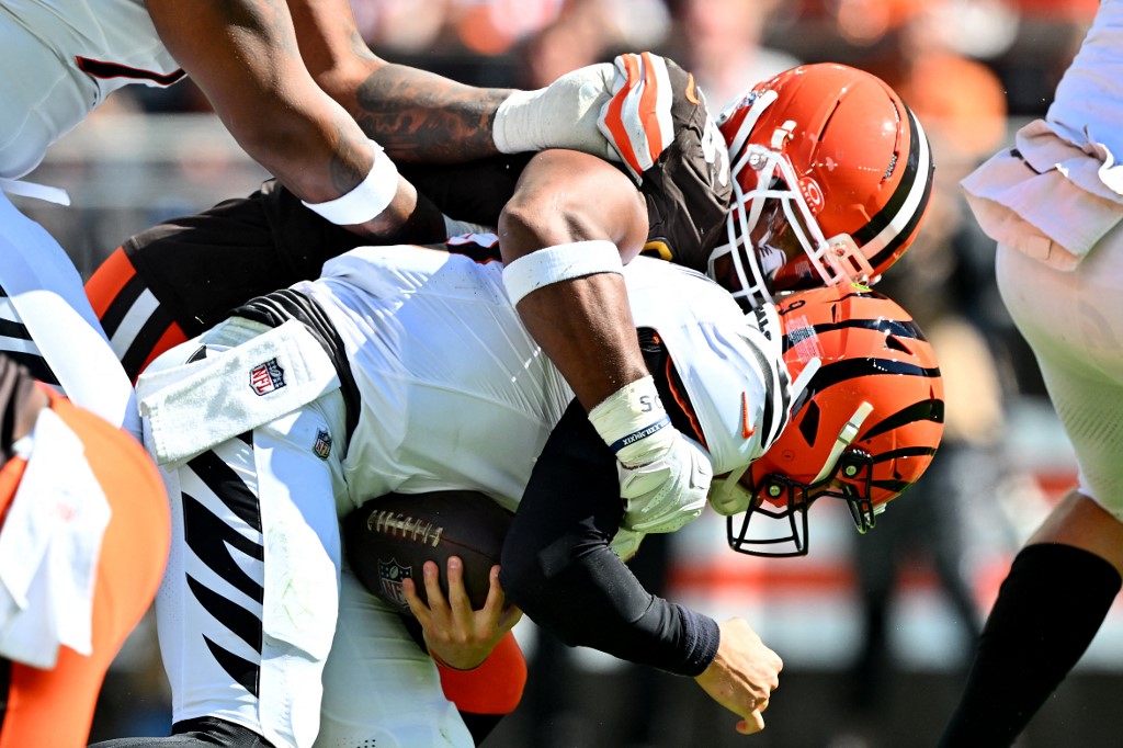 Myles Garrett of the Cleveland Browns, the #1 contender for the NFL Defensive Player of The Year award, sacks Joe Burrow of the Cincinnati Bengals.