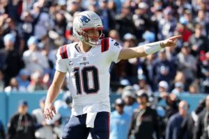 Drake Maye #10 of the New England Patriots reacts against the Tennessee Titans.
