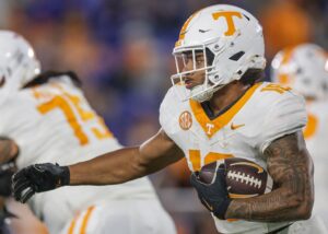 Desean Bishop #18 of the Tennessee Volunteers runs the ball during the second half of the game against the Kentucky Wildcats.