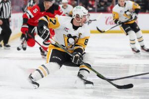 Sidney Crosby #87 of the Pittsburgh Penguins skates with the puck during the first period of a NHL game against the New Jersey Devils.