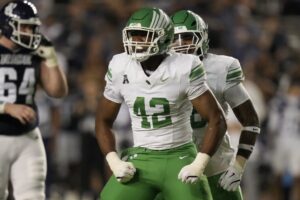 Brayden Knox #42 of the North Texas Mean Green celebrates after a sack during the second quarter against the Rice Owls