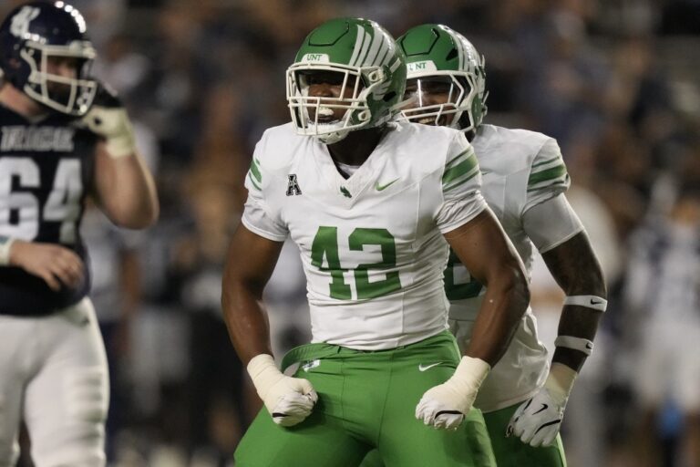 Brayden Knox #42 of the North Texas Mean Green celebrates after a sack during the second quarter against the Rice Owls
