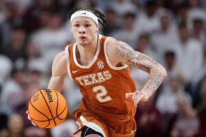 Chendall Weaver #2 of the Texas Longhorns handles the ball against the Texas A&M Aggies.